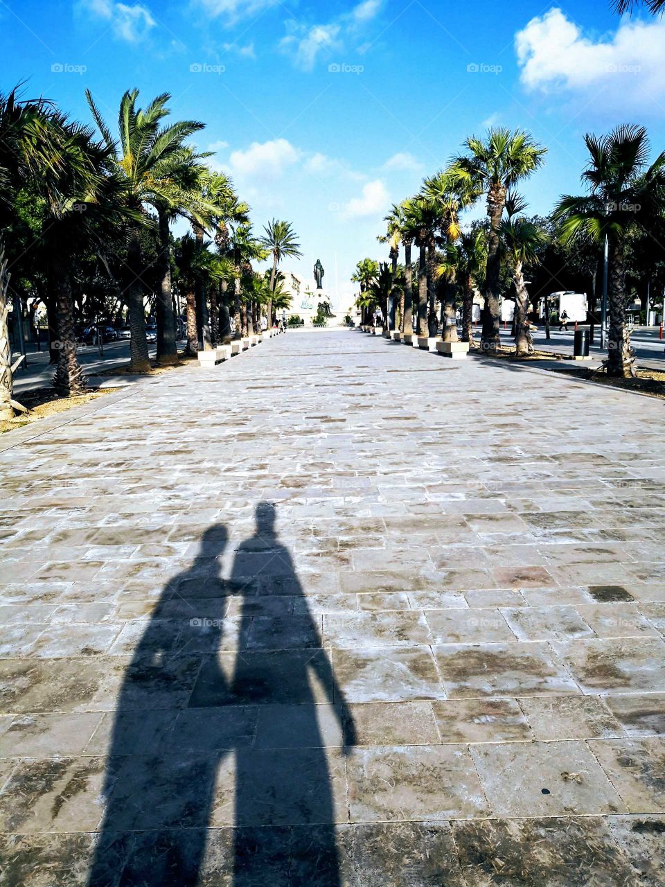 The shadows of couple in Floriana, Malta