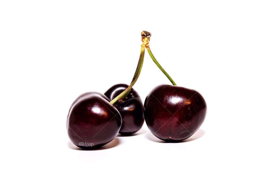 Cherries on white background