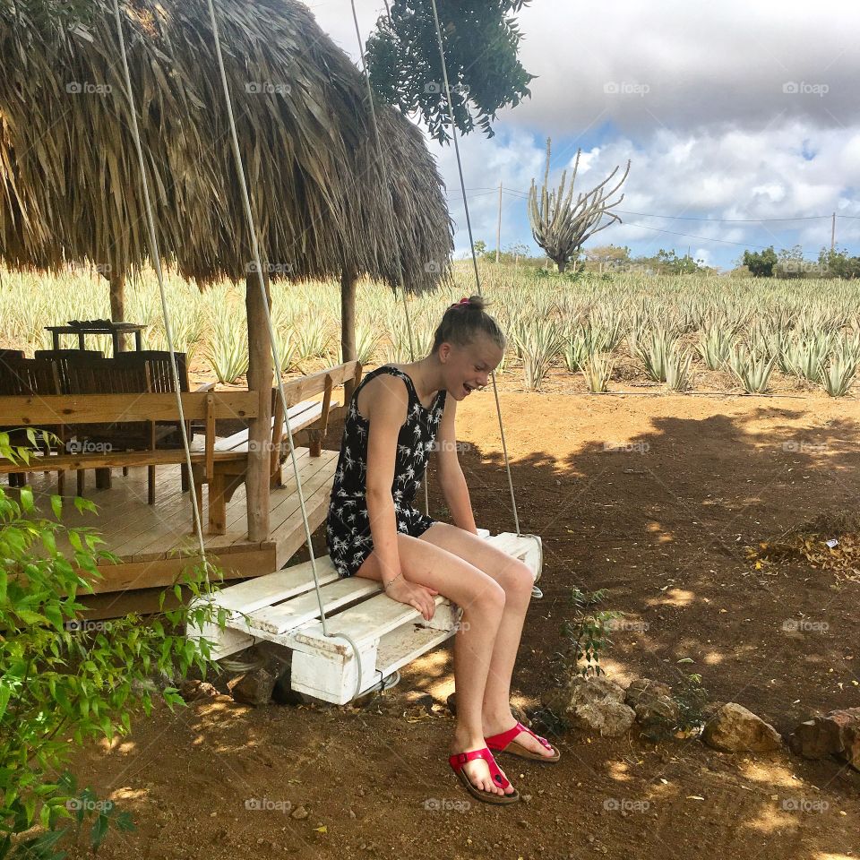 Teenager on a swing