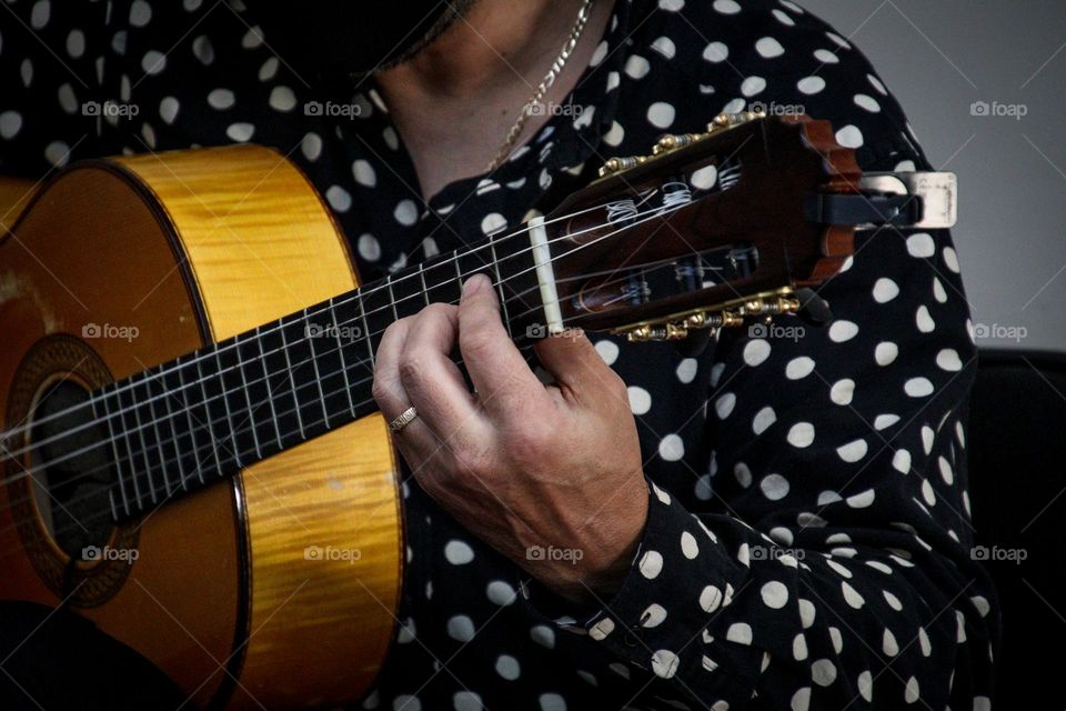 Playing guitar