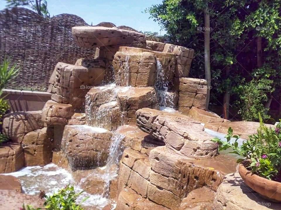 Stone and mud waterfall decorations