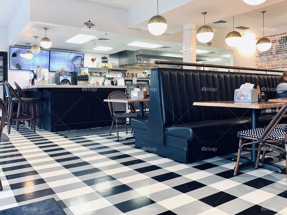 View inside of a delicatessen with traditional black-and-white, checked decor 