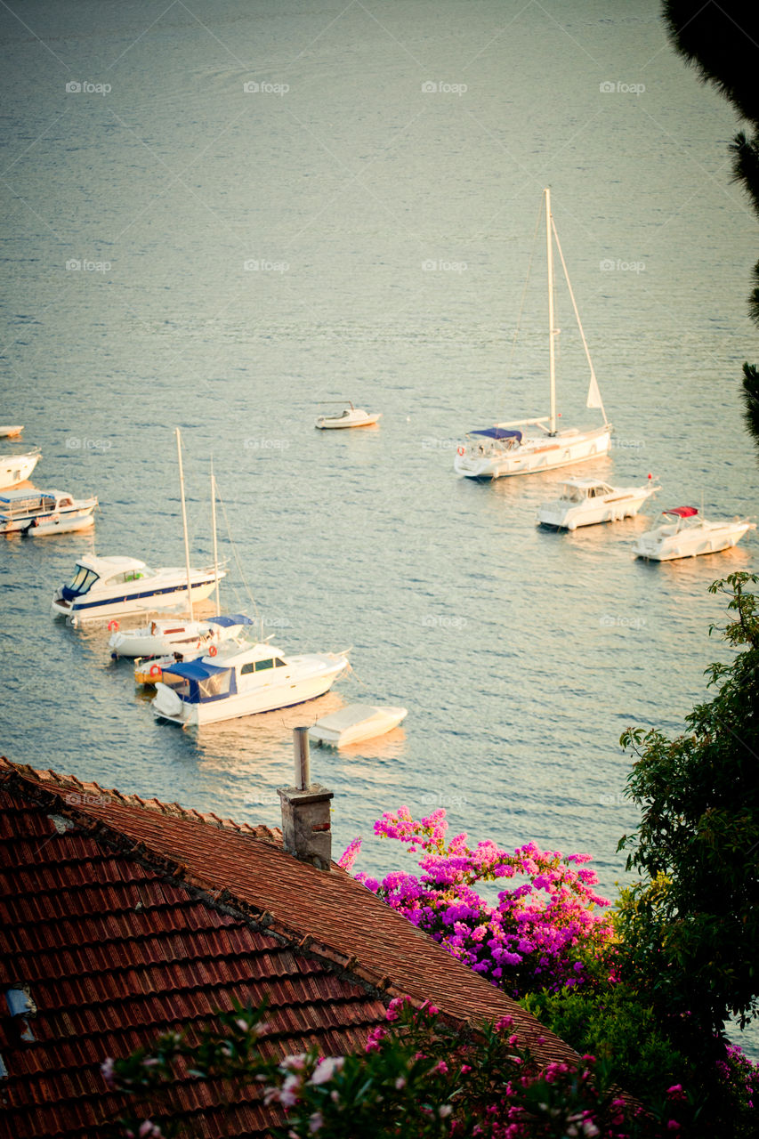 Yachts in Boko Kotor bay at Sunset. Herceg Novi, Montenegro