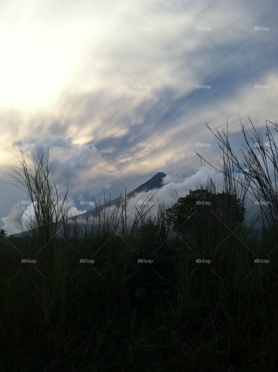 Mayon Volcano grassy cloudy 