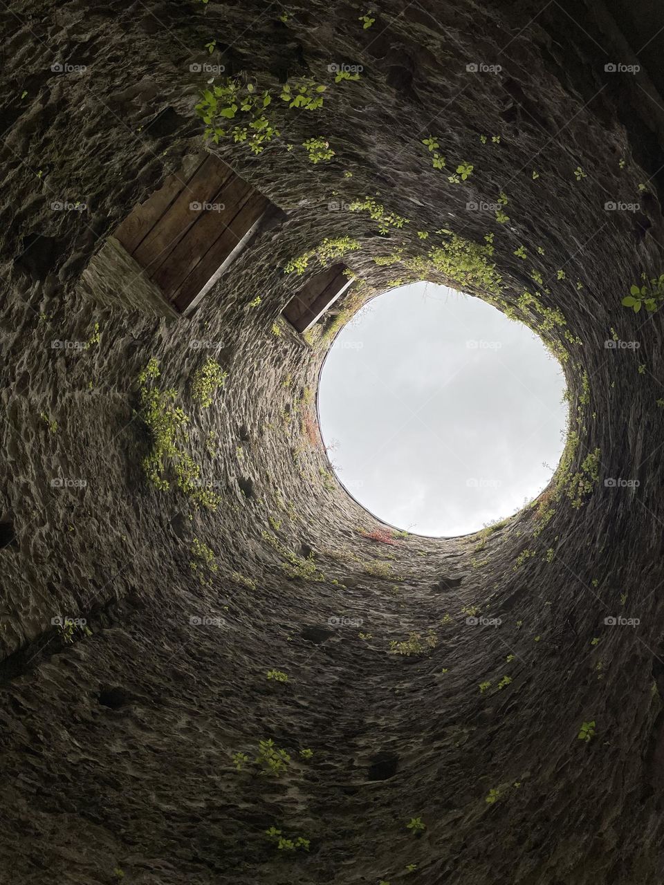 Looking Up A Tower At Open Irish Skies