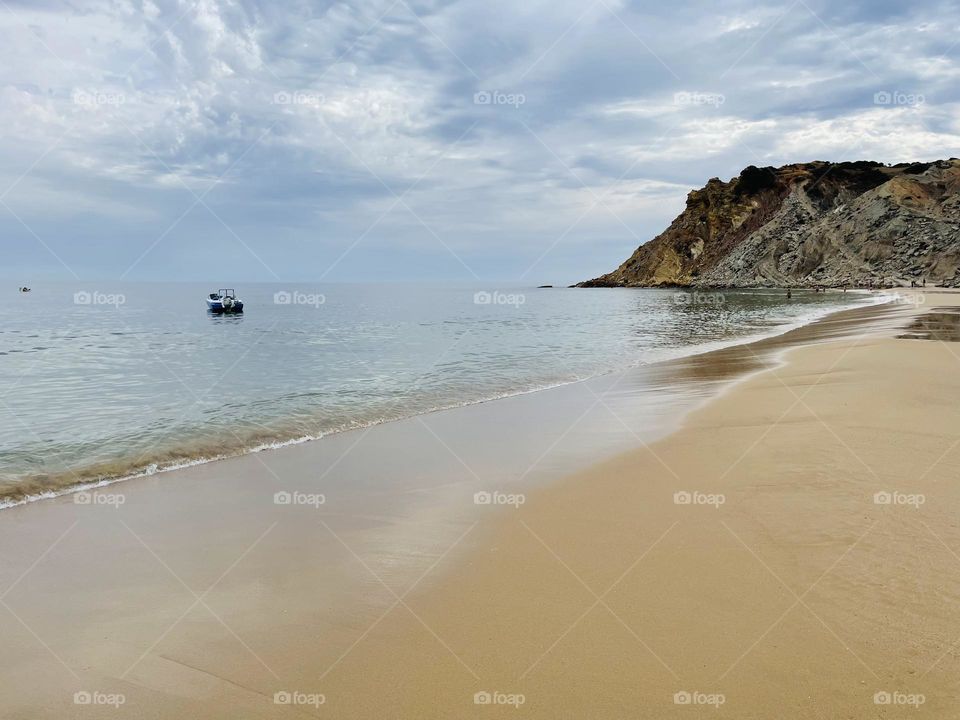 Peaceful Beach, Lonely Boat 