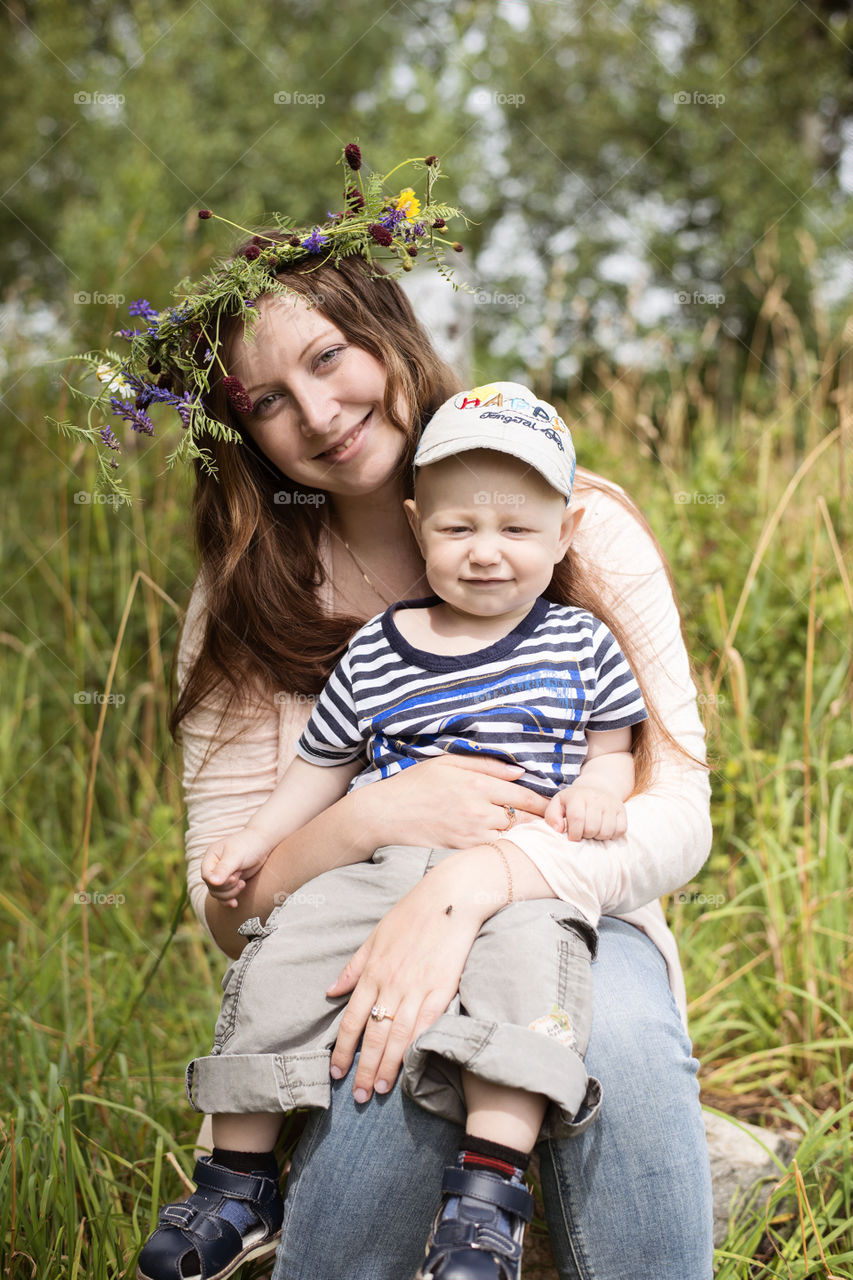 Mother chairing her son