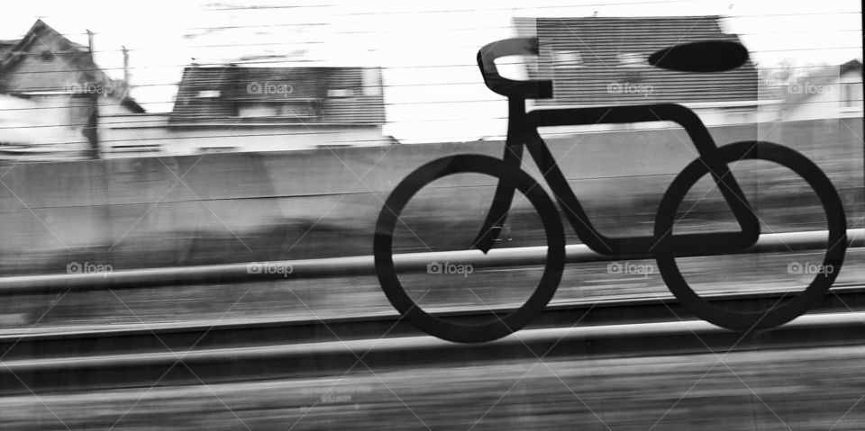 Tour de France. a bike on a railway road.picture taken with a mobile phone