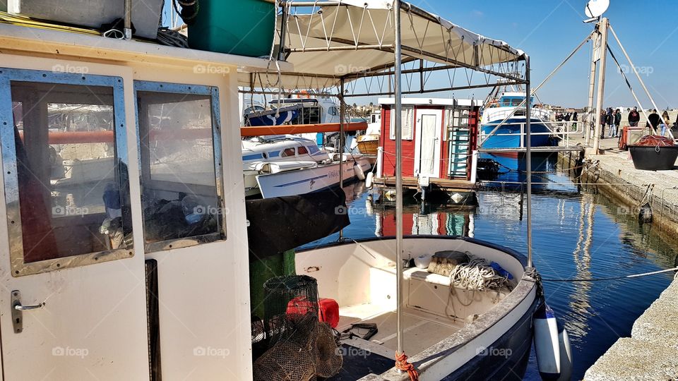 Boat in a small harbour