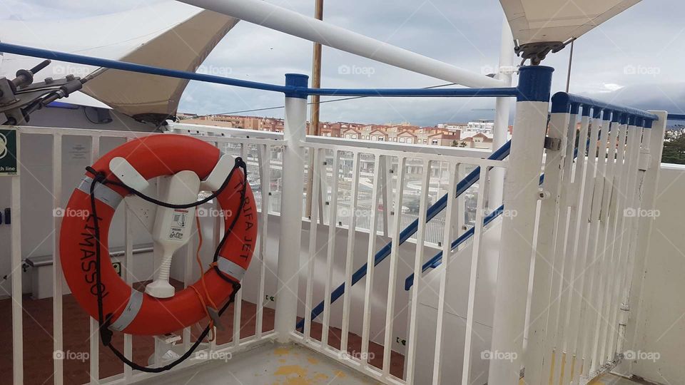 Orange life preservers in the boat