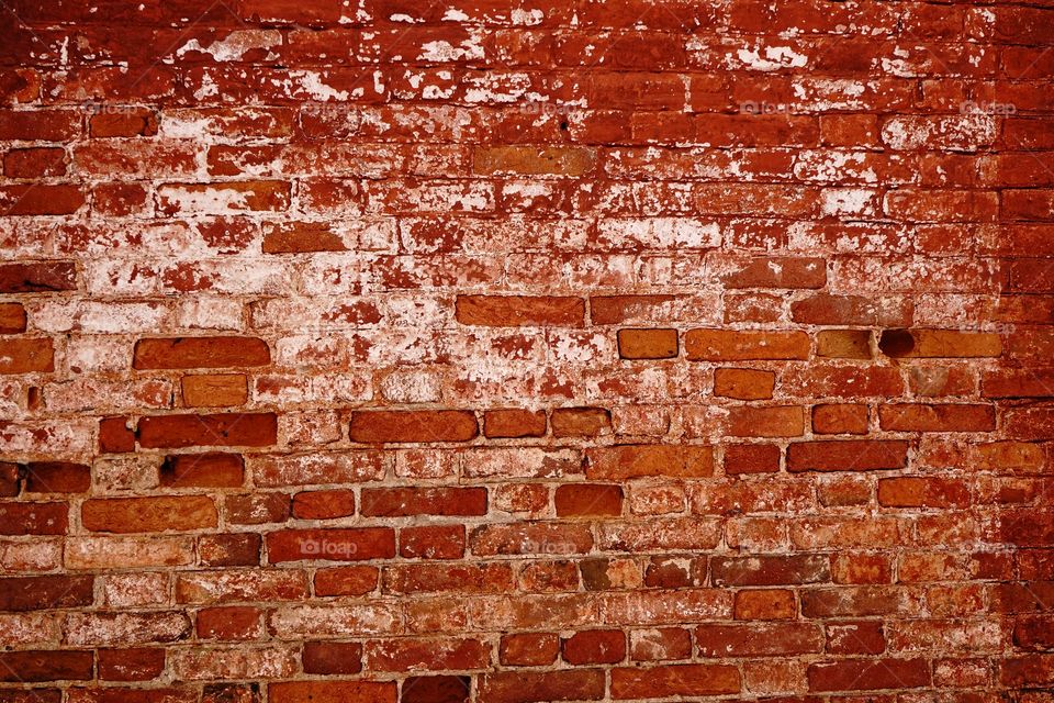 Brick wall close-up red color background textured