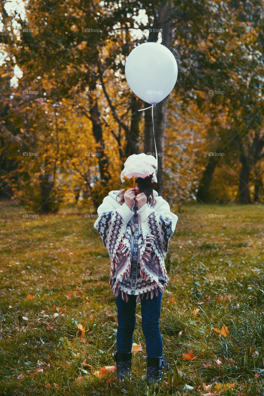 Girl in autumn park