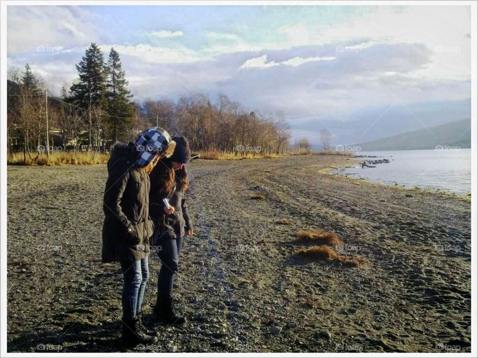 Mother & daughter walking on the beach! 