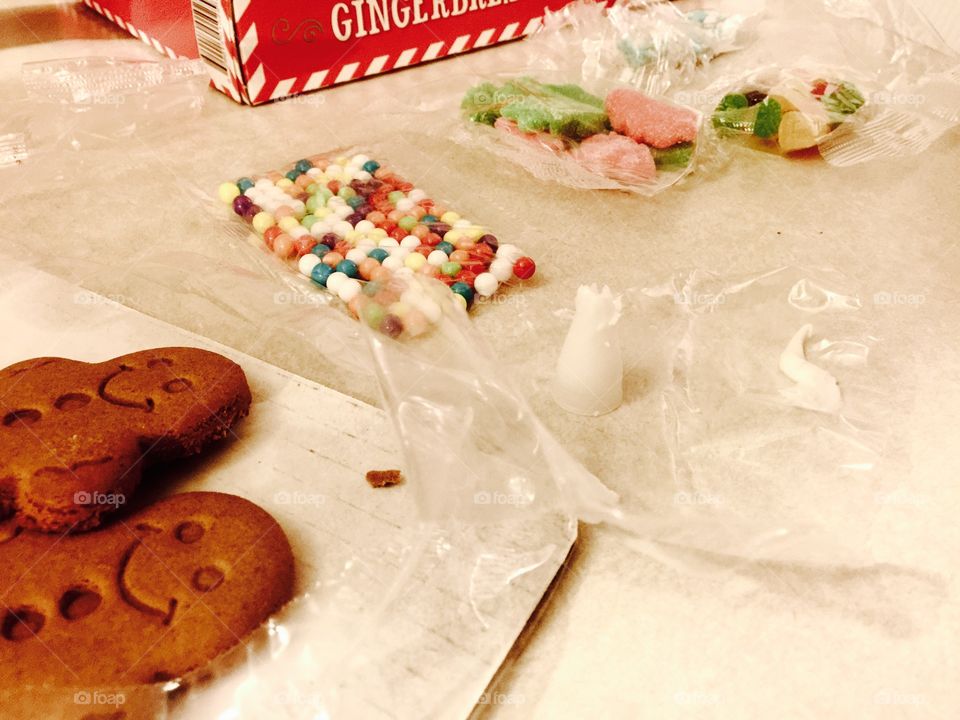 Decorating a gingerbread house 