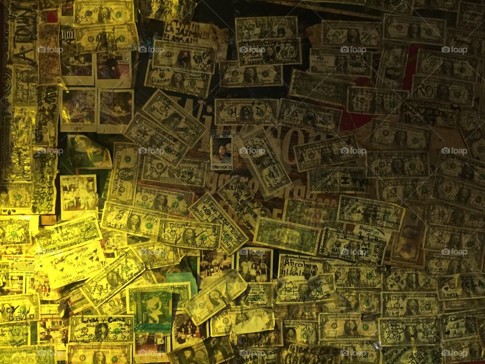Restaurant in Mexico covered with signed 1$ bills