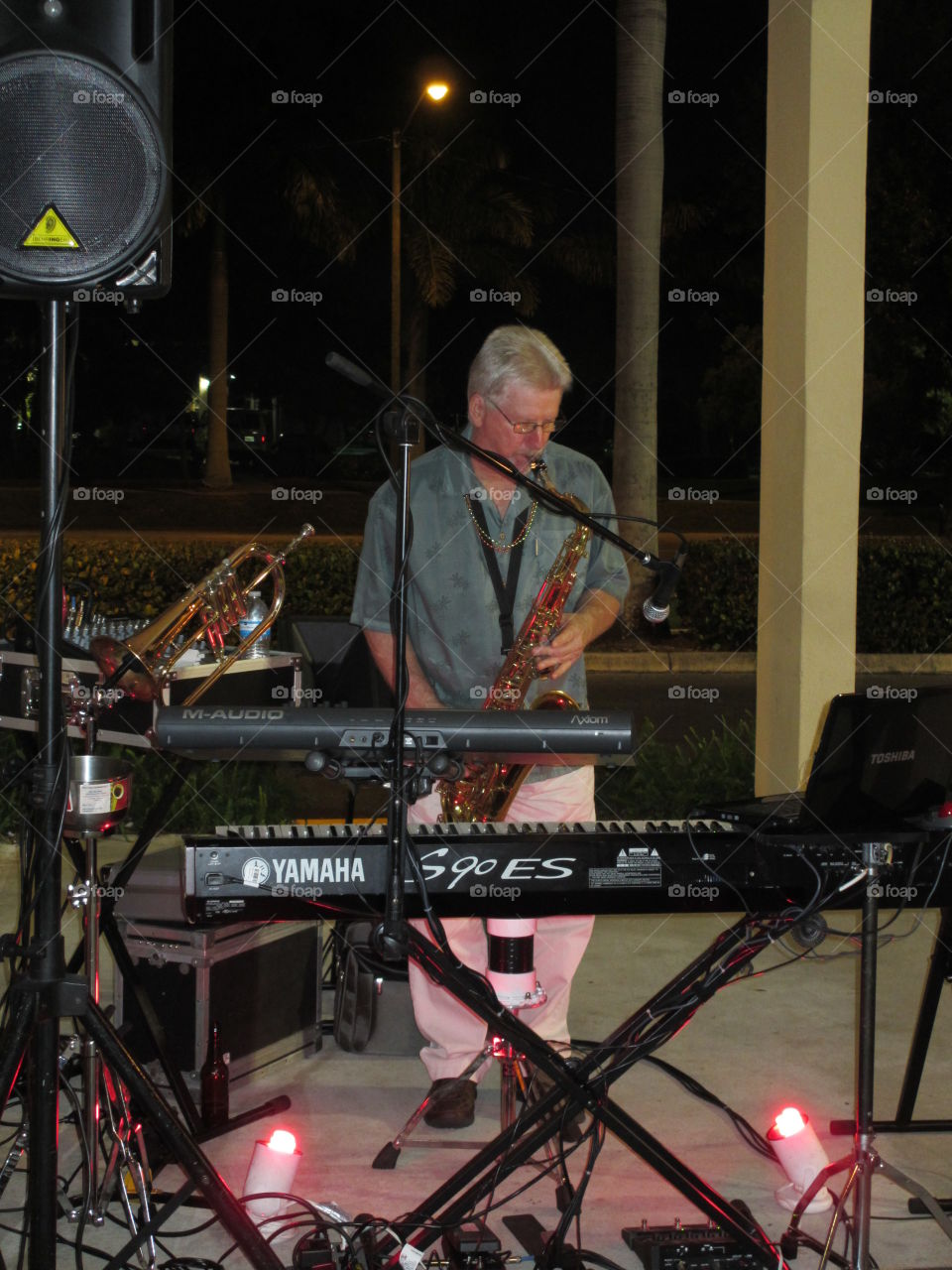 One Man Band. One man band on saxophone, flugel horn, and keyboards.