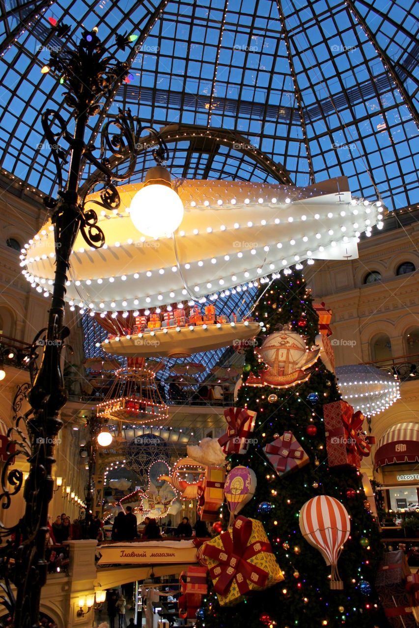 Happy New Year and Merry Christmas. Christmas decorations. Fir branches, shiny balls, garlands, lights and lanterns. gingerbread, dried fruits, nuts. Preparing for Christmas at home and on the streets.