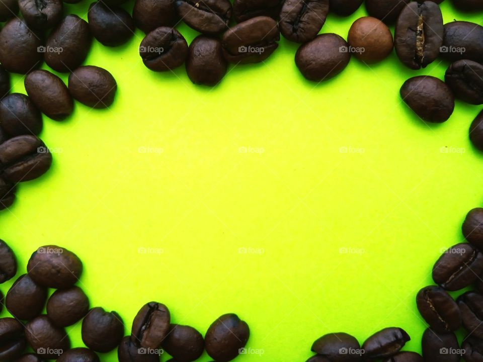 coffee beans on yellow background