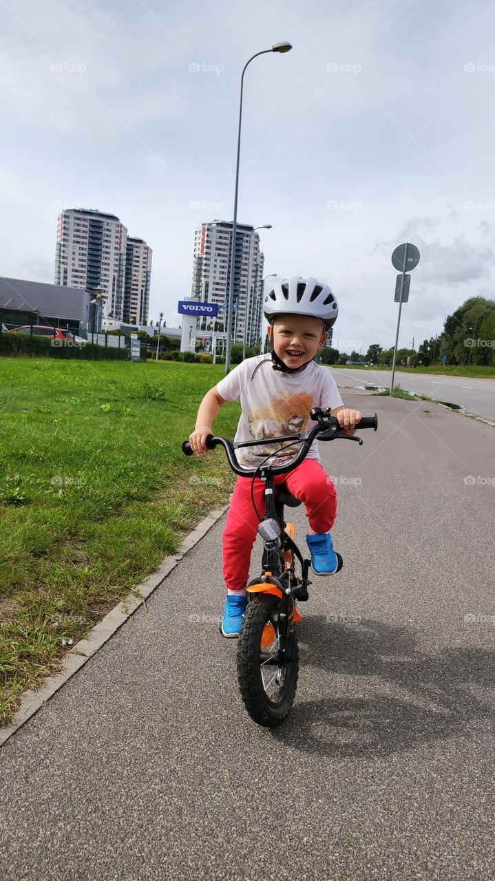 happy Kid on a bike