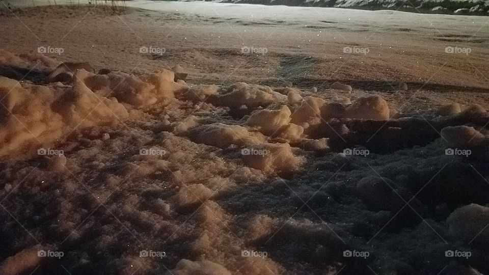 snow glistening in moonlight