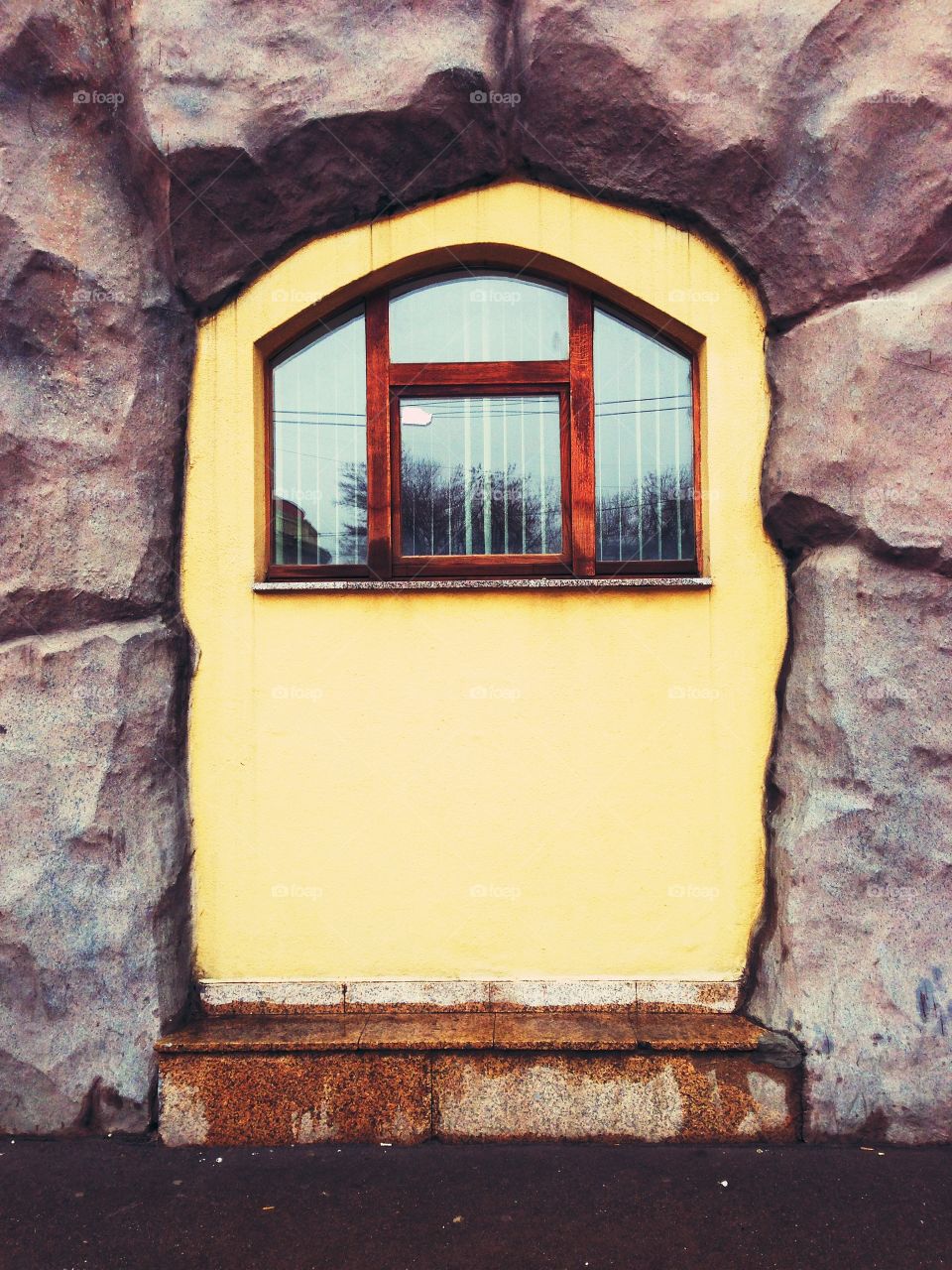 Bright window on rustic wall in Moscow