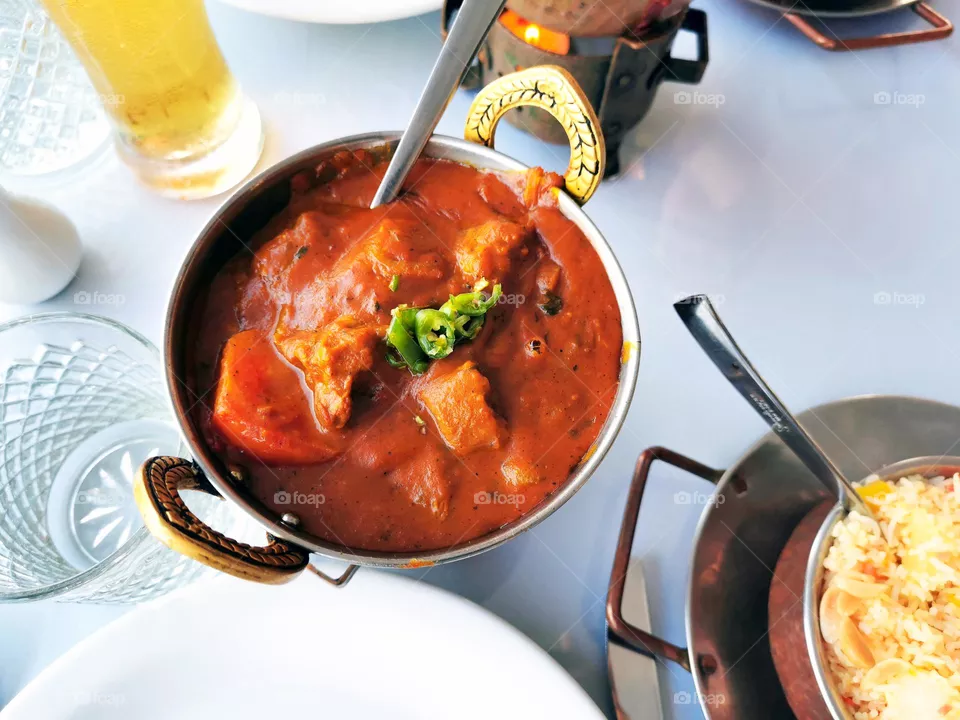 Lamb vindaloo in a bowl.  Traditional Indian curry.