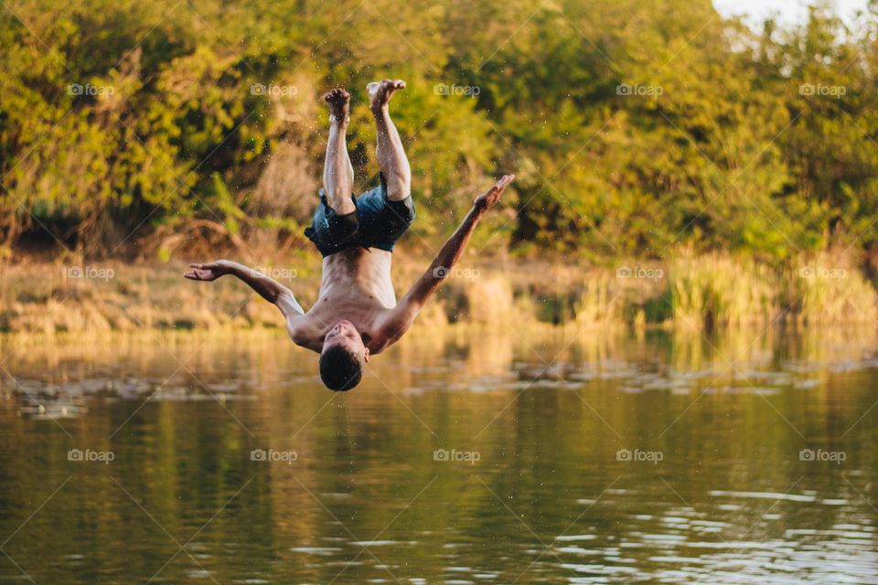 adventure jumping into the lake