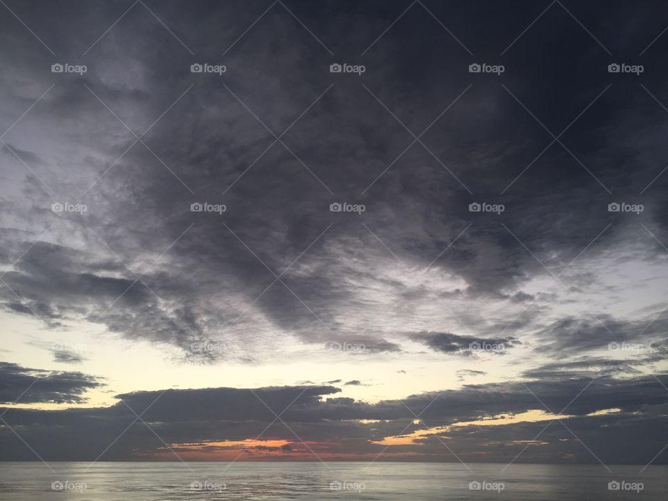 Dark clouds above ocean 