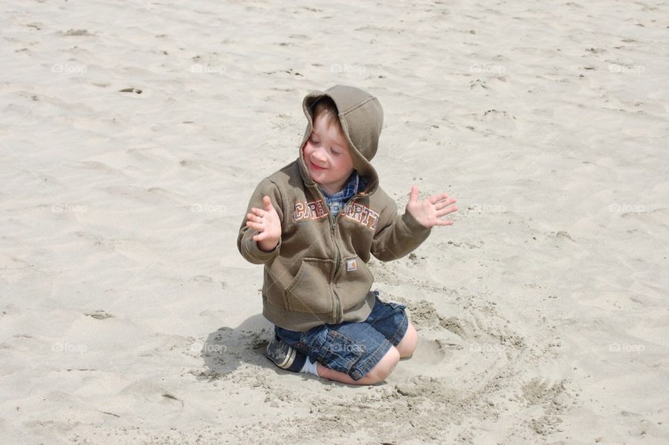 Boy in sand
