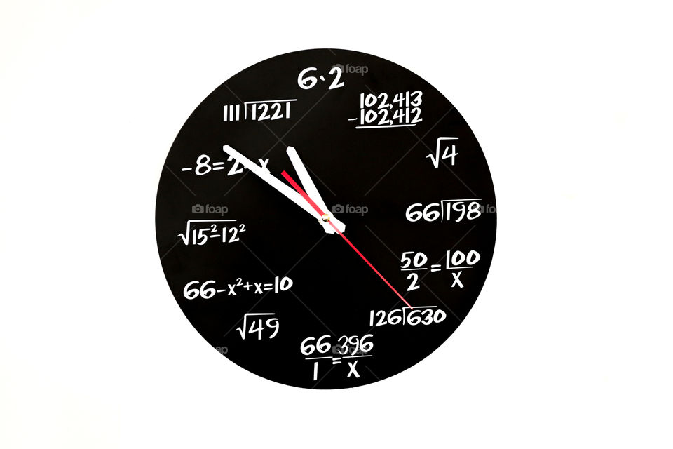 Math clock with equations on the each hour. Isolated on a white background.