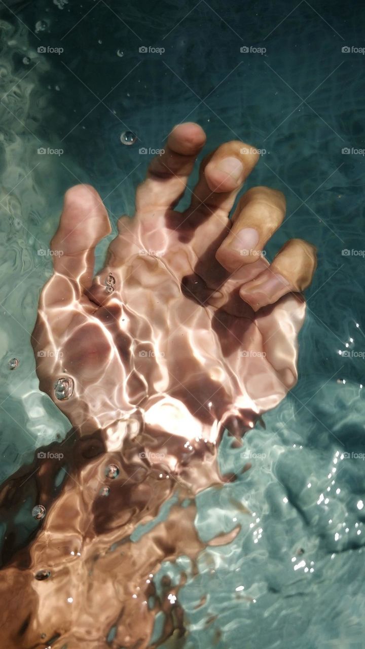 Hand underwater