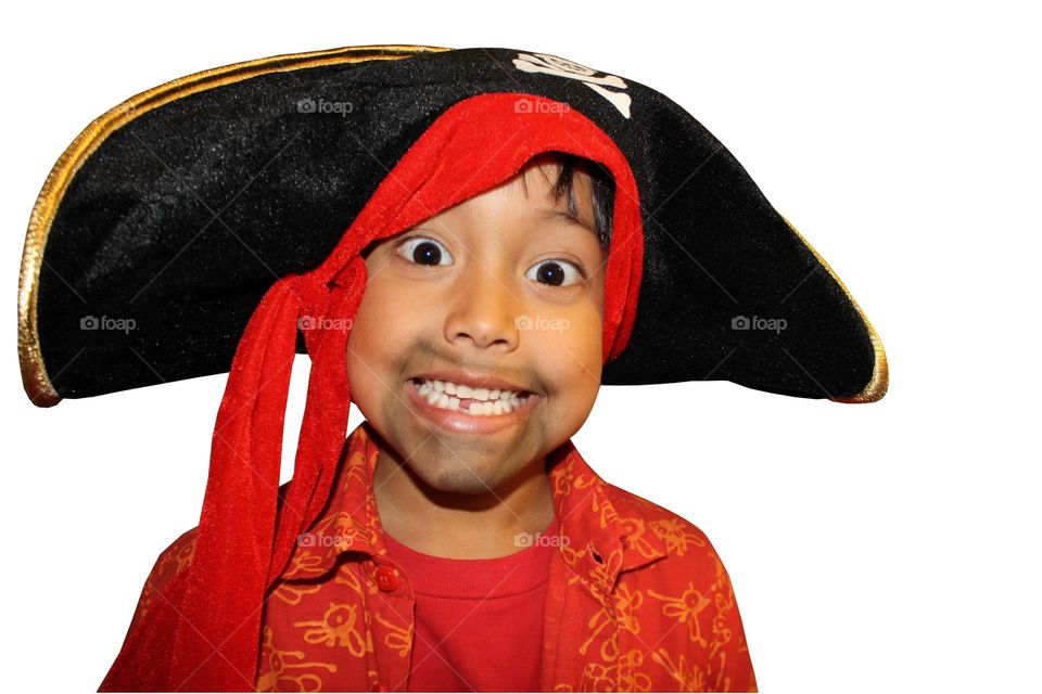 Portrait of a boy in a pirate costume, isolated on white