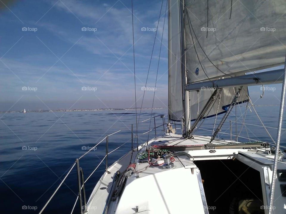 Ocean horizon from a sailboat bow