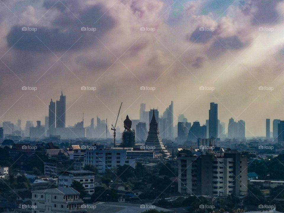A stunning view of Wat Paknam and the Bangkok skyline. The sunburst definitely added to the mood.