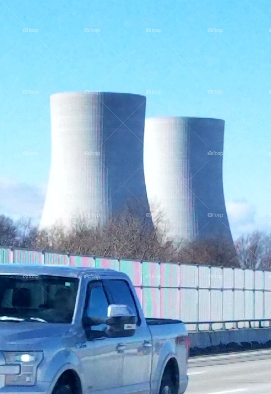 Nuclear power plant Cooling Towers as seen from highway.