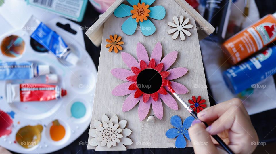 Painting a wooden bird house