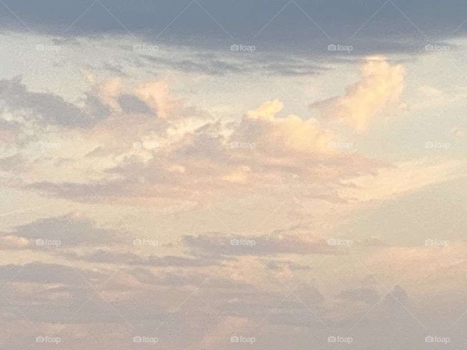 Adorable view of the sky with white and grey clouds 