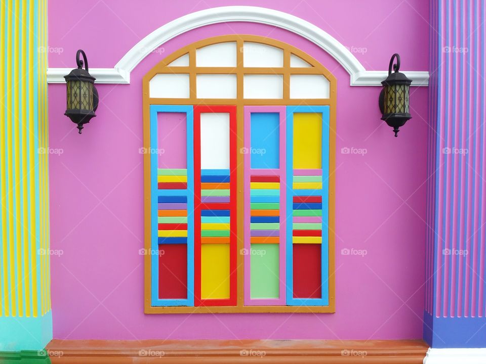 Beauty colorful on the wall. Decoration of various colors on a beautiful window. Colorful, refreshing.