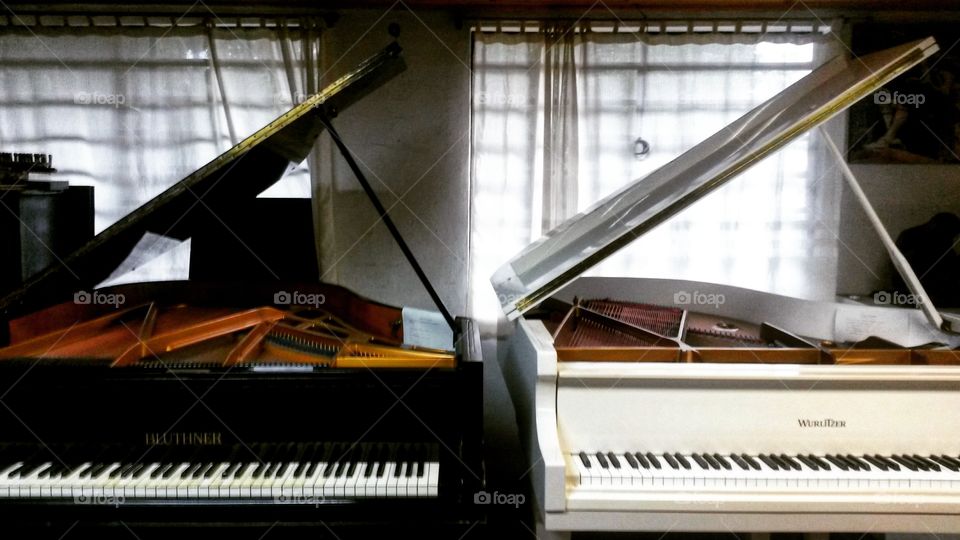 Black and white pianos