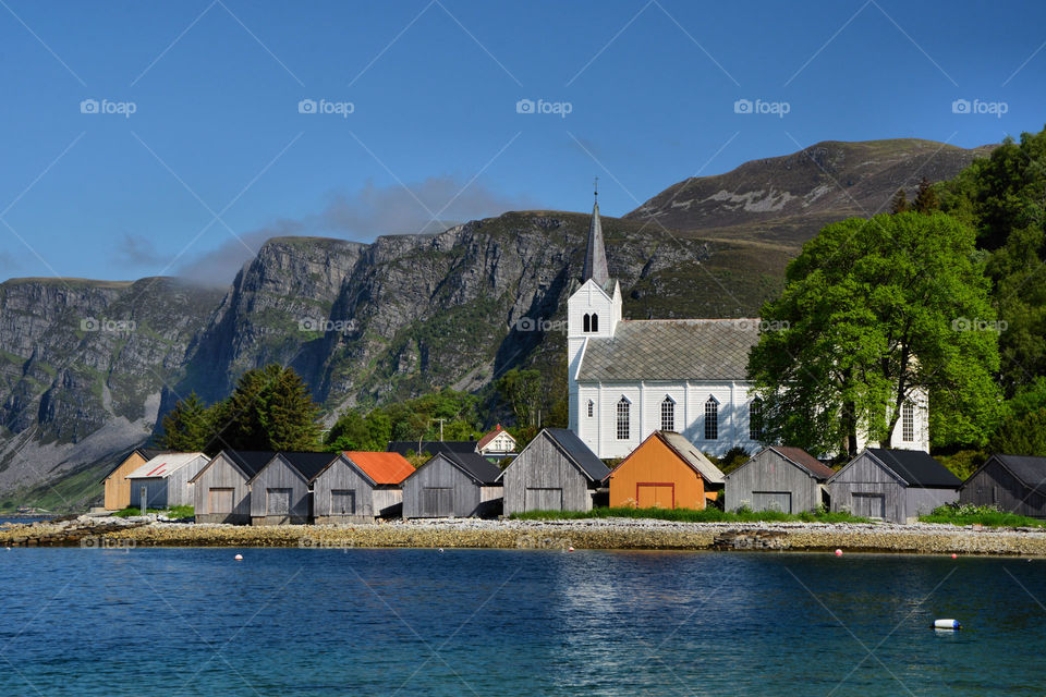 Church and boathouses in Selje