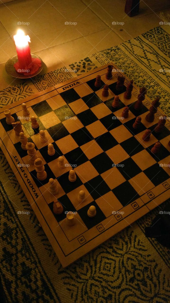 Chess board candle lit