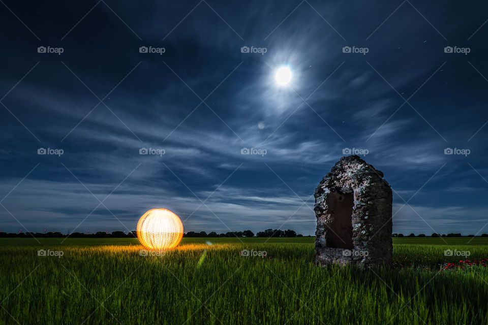 Light trails on field at night