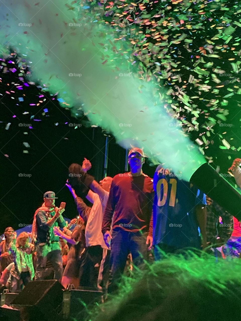 Crowd photography at a concert with confetti 🎉