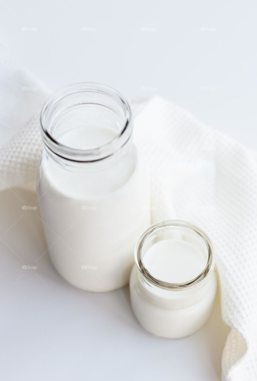 Milk in glasses bottles.