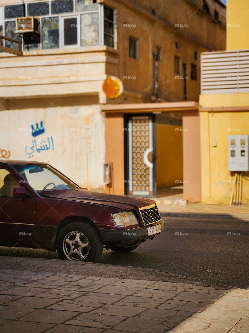 When I just went for a walk, I saw this car is parked on a roadside.