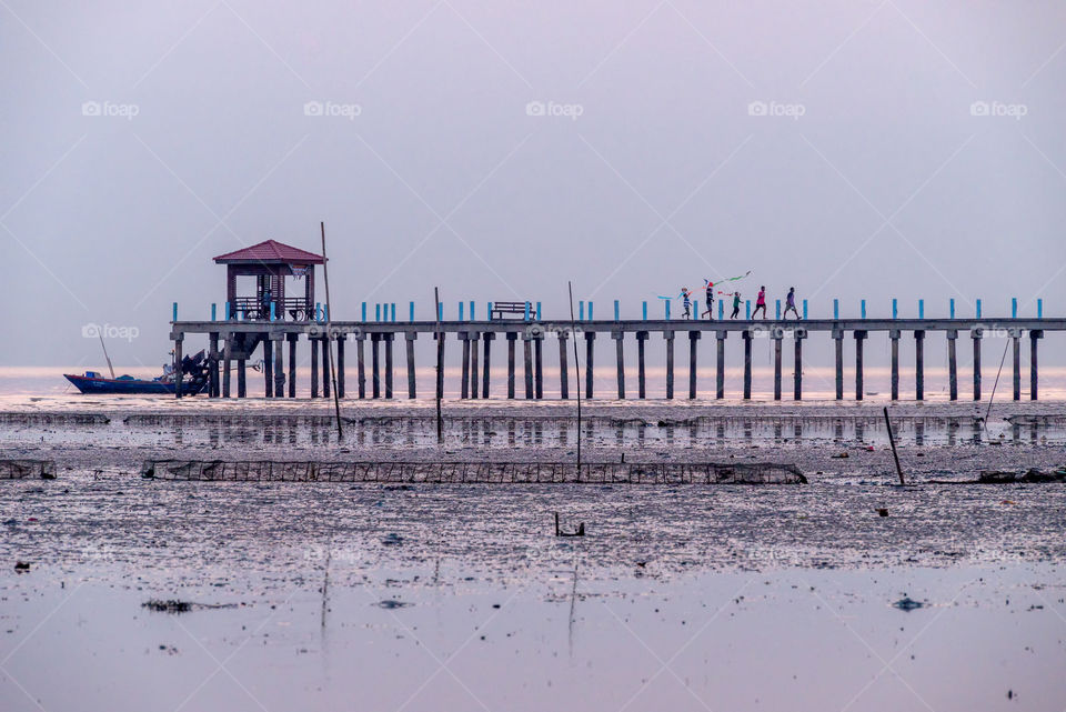 Enjoy on the bridge in sunset moment