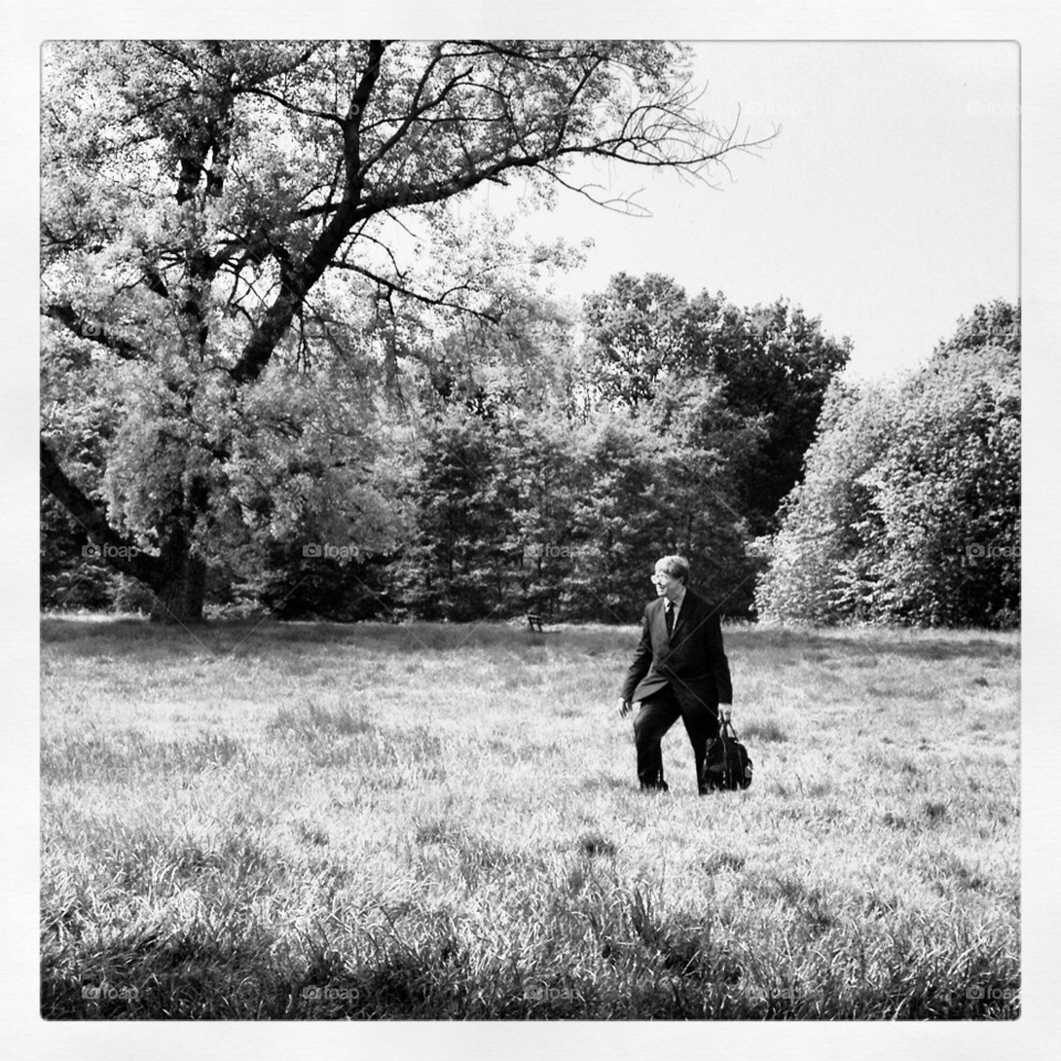 park wandering suited man hampstead heath. london by alicedebarrau