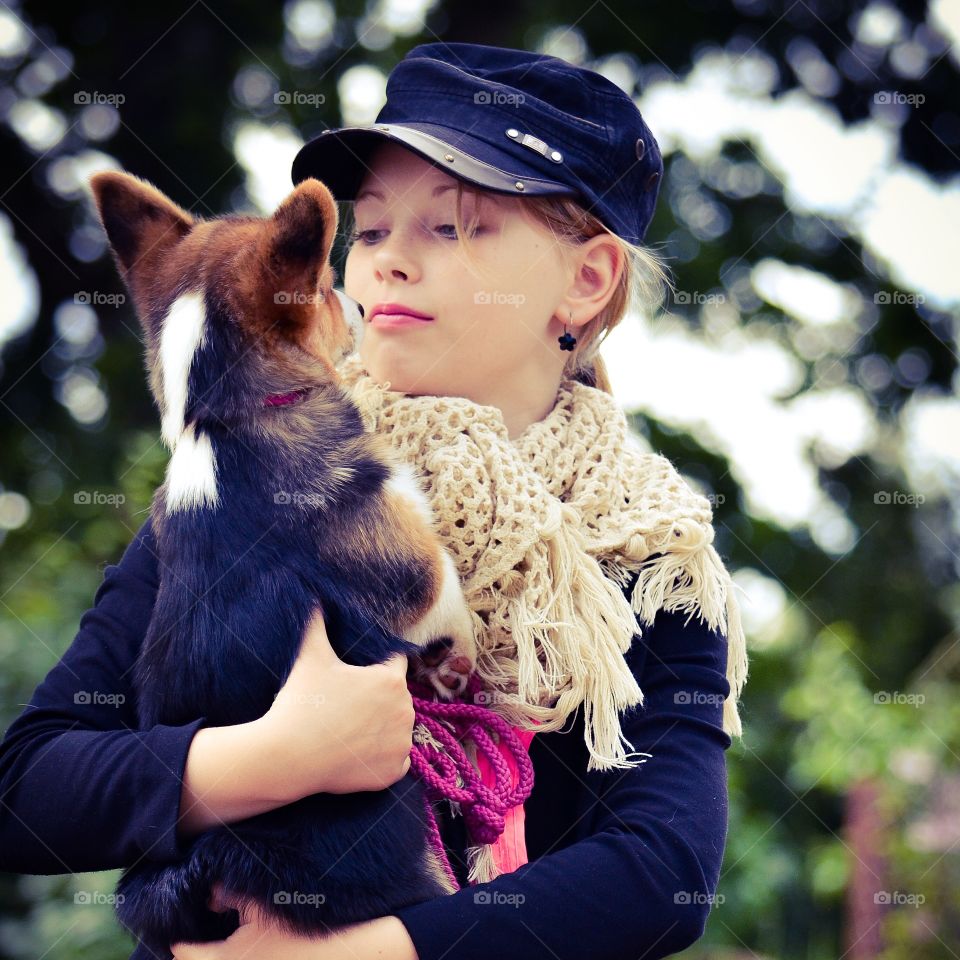 Love. Girl with her puppy