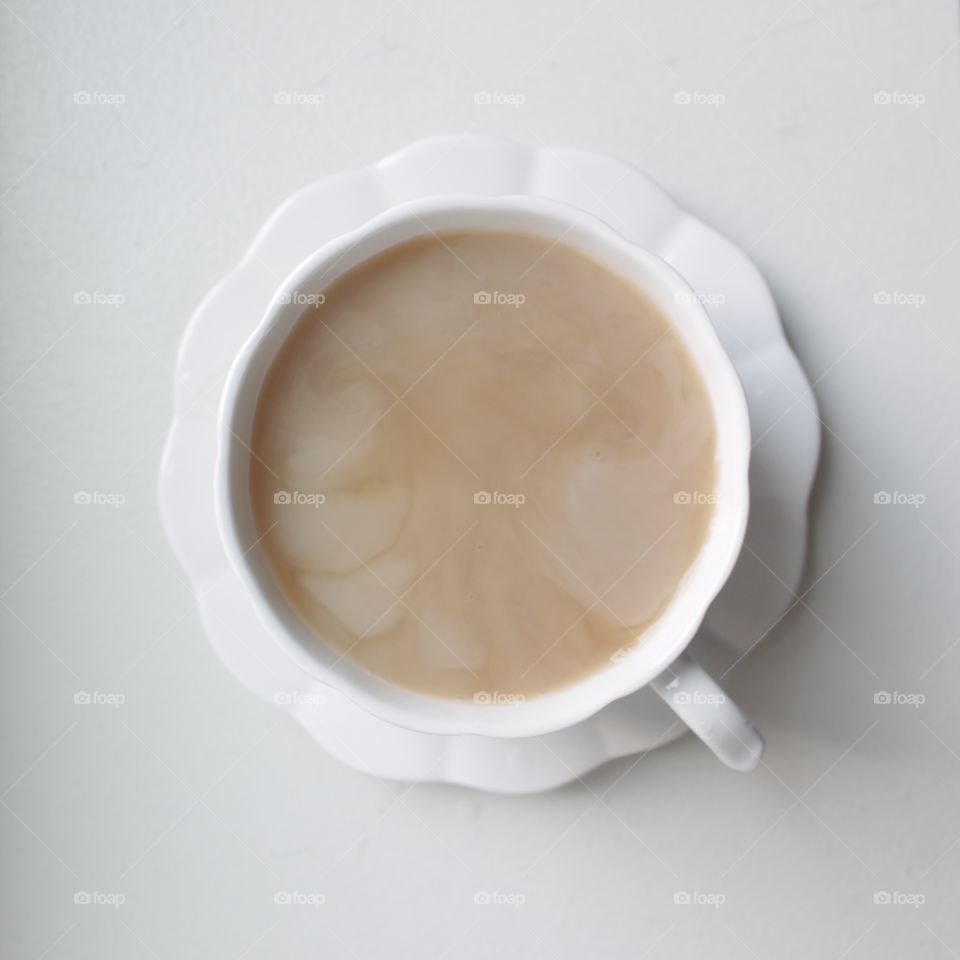 A cup of a tea on white background