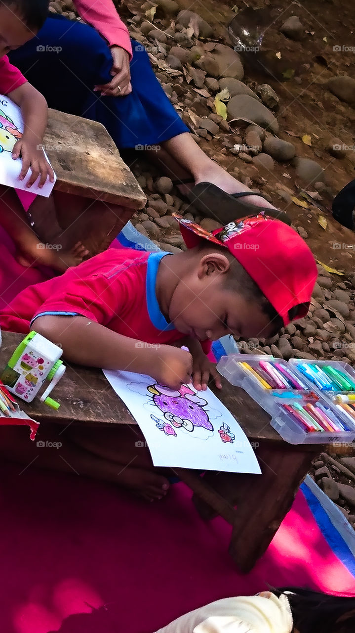 Coloring contest on independence day with cartoon themes made with colored pencils by children